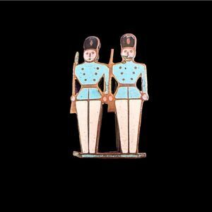 Vintage enamel on gold tone metal soldiers pin brooch